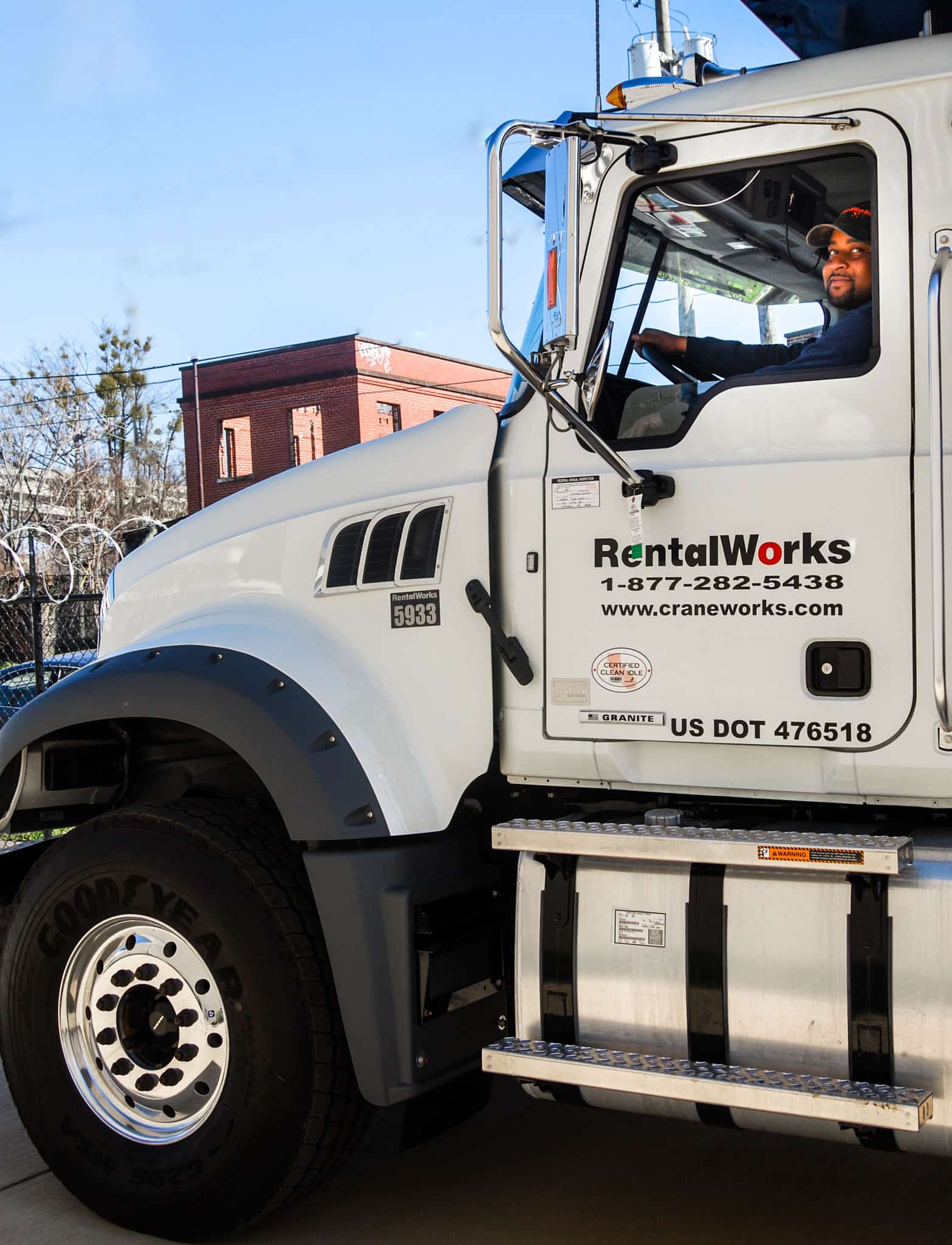 A Truck Is Parked On The Side Of A Building